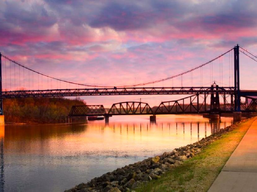 Clinton riverfront bridges at sunset